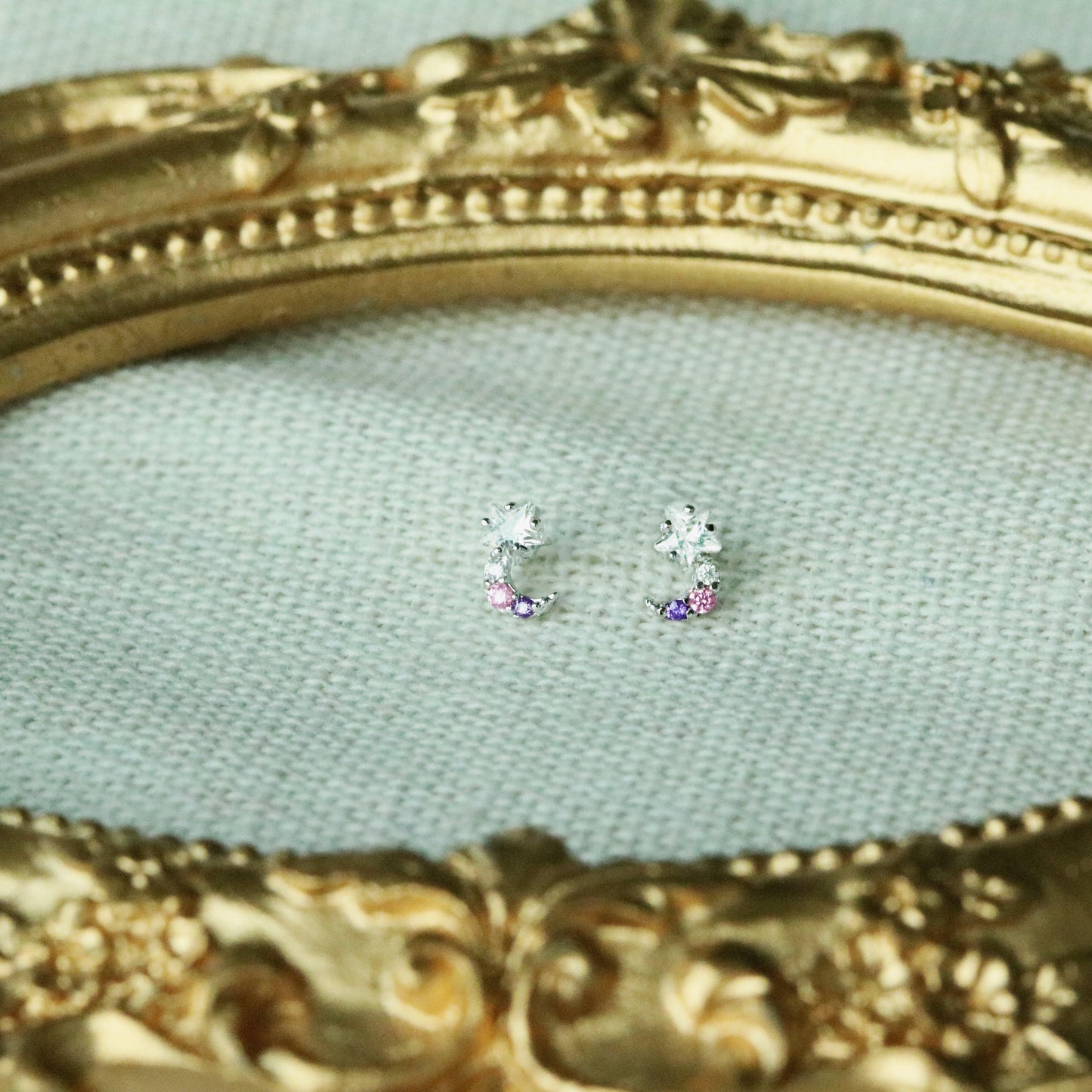 Tiny moon earrings