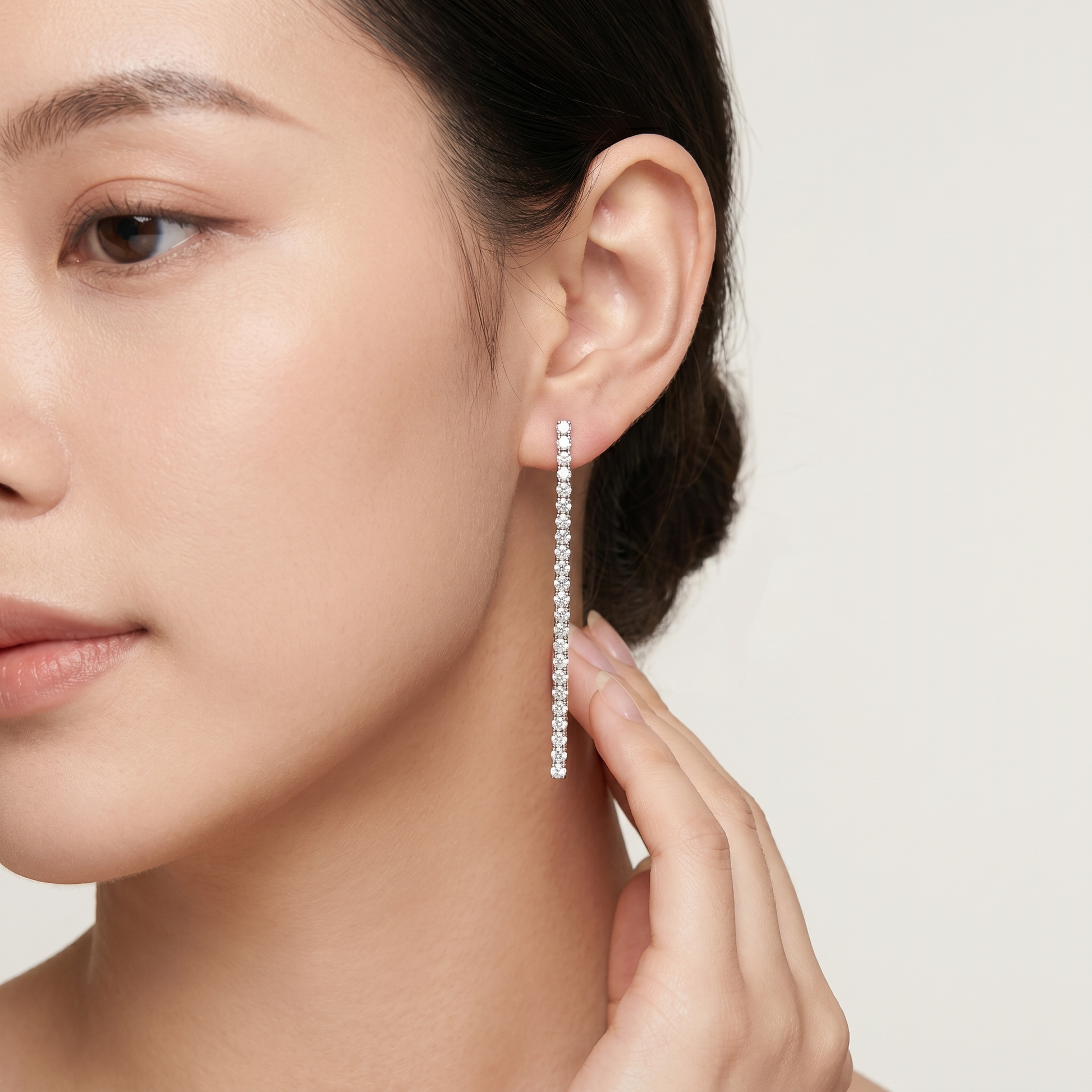 Woman Wearing LUCIENNE 925 Sterling Silver Tennis Drop Earrings with Sparkling AAAA Zirconia